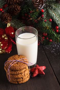 Cookie with milk on the table for Santa Claus