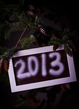 Chalkboard on the pine with title "2013"