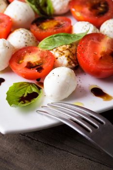 Classic caprese salad closeup on the plate