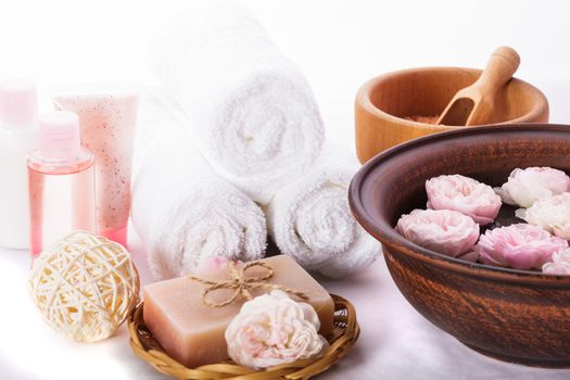 Spa with roses, manicure, relaxing bath and cosmetics