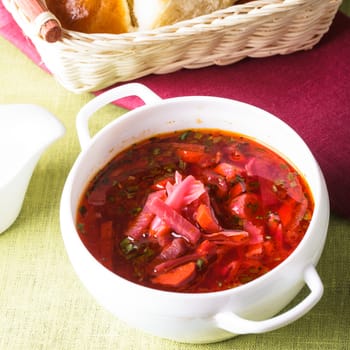 Russian cuisine - borsch - beetroot soup in a bowl