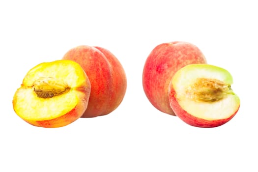 Group of ripe pink and yellow peaches