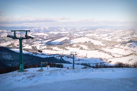 Winter mountains with snow and ski lift