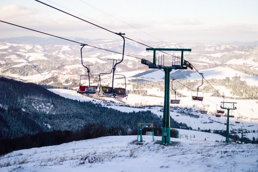 Winter mountain landscape and ski lift view