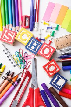 Primary school stationery on a white background