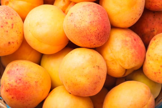 Apricots in a basket on the table