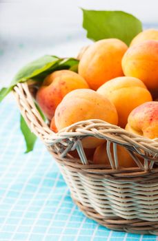 Apricots in a basket on the table