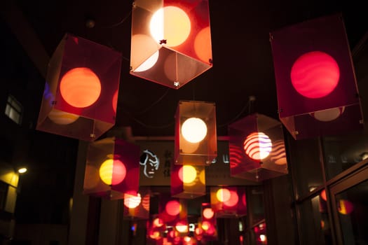 Red lanterns, lamps above the shop entrance, oriental style, chinese.