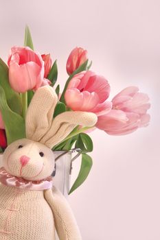 Easter decoration with rabbit and pink tulips