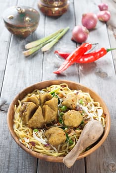 Mee bakso. Bakso or baso is Indonesian meatball  made from beef surimi. Popular local food in Indonesia.  Fresh hot with steam smoke.