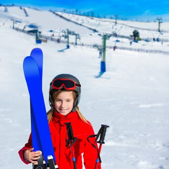 Kid girl winter snow with ski equipment helmet goggles poles