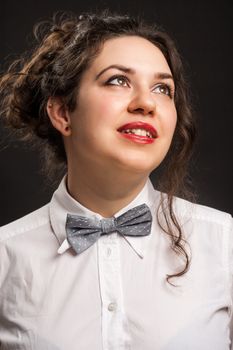 stylish astonished woman portrait , with dark background