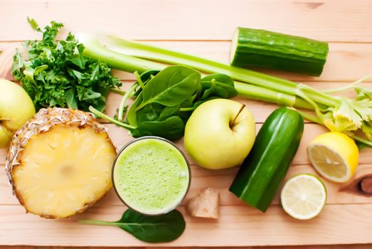 healthy organic green detox juice on wood