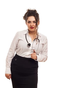 attractive lady doctor with stethoscope on white background