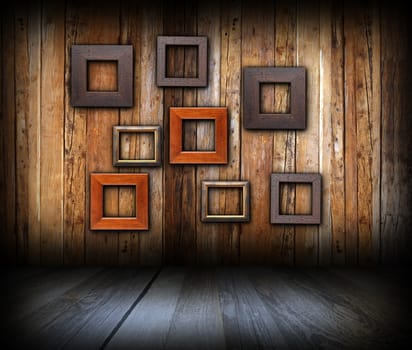 abstract frames on wooden wall, art backdrop for your design