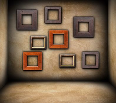 wooden frames on grungy wall of empty room, backdrop