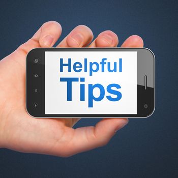 Education concept: hand holding smartphone with word Helpful Tips on display. Mobile smart phone on Blue background, 3d render