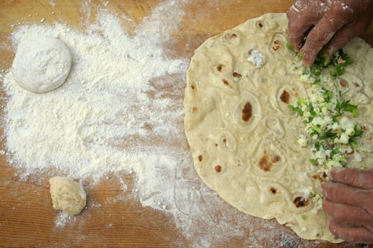 Making homemade pastry "(turkish pastry named gozleme)"