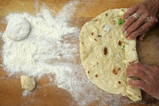 Making homemade pastry "(turkish pastry named gozleme)"