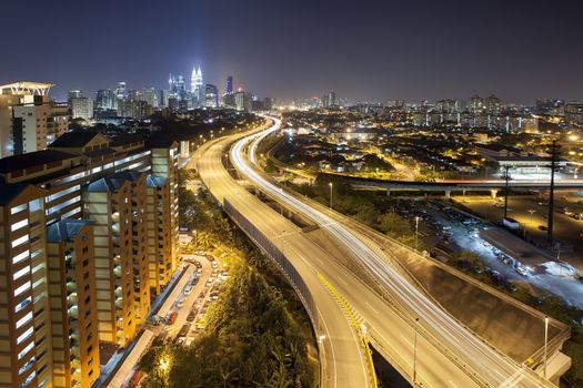 Ampang Kuala Lumpur Elevated Highway AKLEH with City Skyline in Malaysia at Dusk