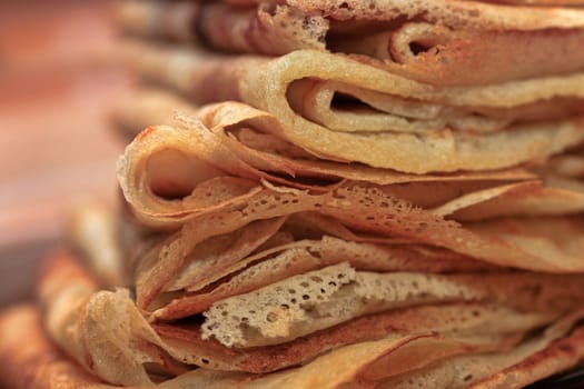 Close up of a pancakes pile with copy-space on the top