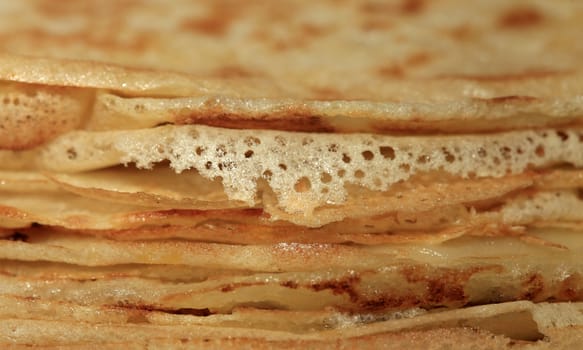 Close up of a pancakes pile with copy-space on the top