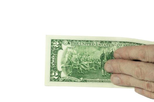 Mans hand holding a stacks of paper dollars USA on the white background