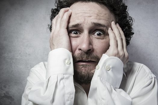 businessman with very afraid, man in white shirt with funny expressions