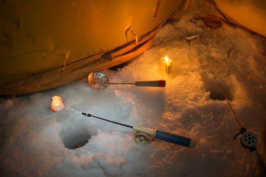 Winter fishing in the tent at night