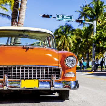 MIAMI BEACH - MARCH 20. Vintage Car Parked along Ocean Drive in the Famous Art Deco District in South Beach. South Beach, FL, March 20, 2011. 