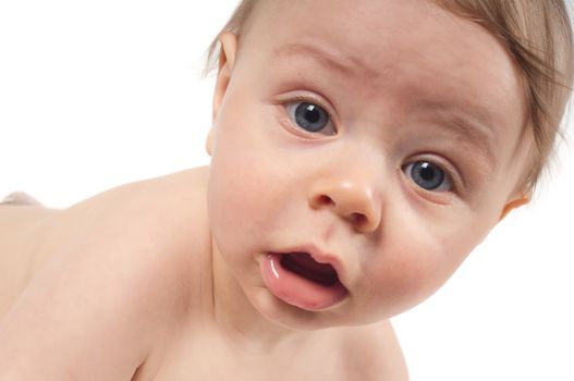 Serious baby watching on you, isolated on white