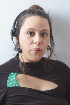 thirty something phone agent with headset with suprise expression
