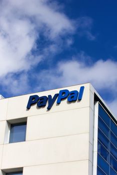 SAN JOSE, CA/USA - MARCH 1, 2014:  PayPal Corporate Headquarters Sign. PayPal is an international e-commerce business allowing payments and money transfers to be made through the Internet.