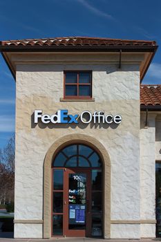 MORGAN HILL, CA/USA - FEBRUARY 22, 2014:  FedEx Office Building. FedEx Office is a chain of stores  providing a retail outlet for FedEx Express and FedEx Ground shipping, as well as printing, copying, and binding services.