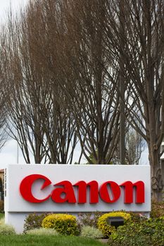 SAN JOSE, CA/USA - MARCH 1, 2014:  Canon Corporate Headquarters Sign. Canon is a Japanese multinational corporation specialized in the manufacture of imaging and optical products.