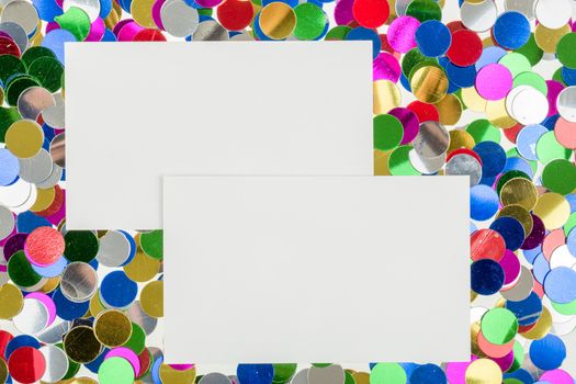 close up of small color confetti and empty card