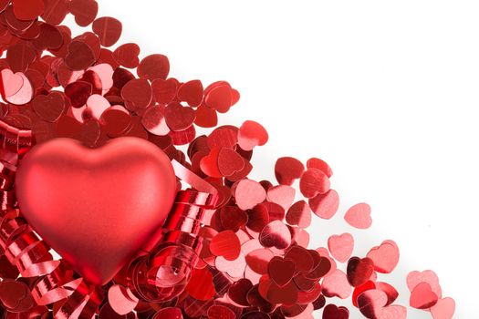 small red hearts confetti isolated on white background