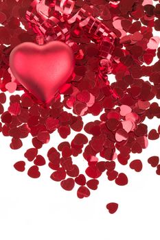 small red hearts confetti and big heart isolated on white background