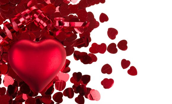 small red confetti and big hearts isolated on white background