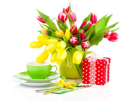 tulips flowers with cup tea, on a white background. breakfast for mommy, happy mothers day, morning drink, romantic still life, fresh flowers
