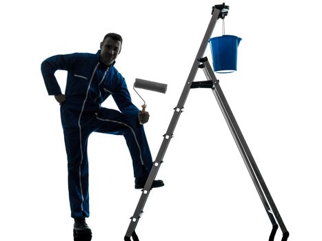 one caucasian man house painter worker silhouette in studio on white background