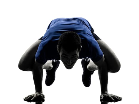 man exercising workout fitness aerobics posture in silhouette studio isolated on white background