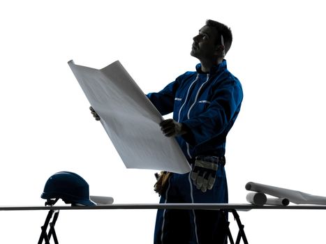 one caucasian man construction Architect working plans silhouette in studio on white background