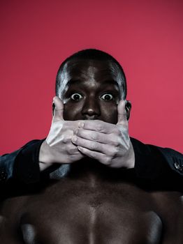 one african man hand on his mouth Freedom of speech concept