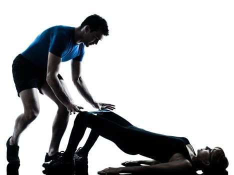 caucasian aerobics instructor with mature woman exercising fitness workout in silhouette studio isolated on white background