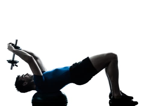 one caucasian man exercising weight training bosu workout fitness in silhouette studio isolated on white background