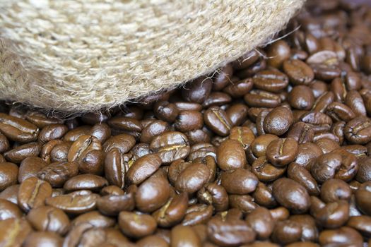 Details of coffee beans and jute bag texture