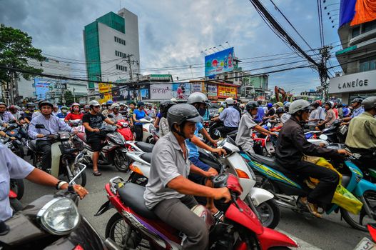 Saigon, Vietnam - June 15: Road Traffic on June 15, 2011 in Saigon (Ho Chi Minh City), Vietnam. Ho Chi Minh is the biggest city in Southern of Vietnam.