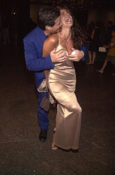 Bryan Genesse and Elizabeth Giordano at the premiere of Very mean Men in Beverly Hills. 08-15-00