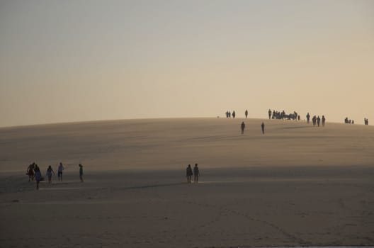 People on the dune top in Jericoacoara Beach